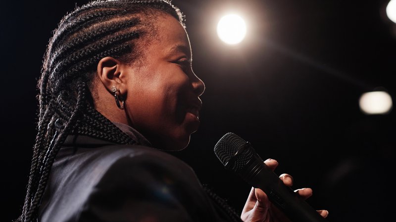 female singer performing on stage