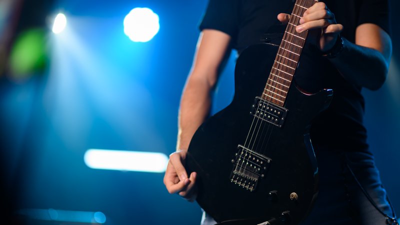electric guitar player on stage