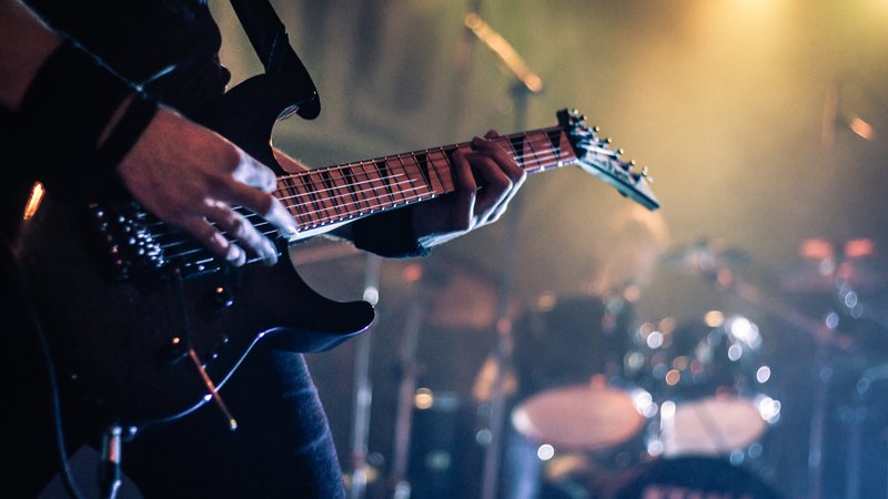 heavy metal guitar player on stage