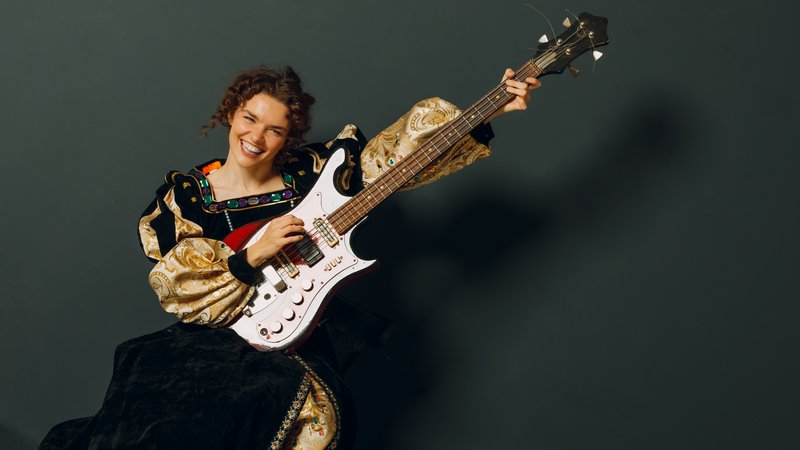opera singer with electric guitar