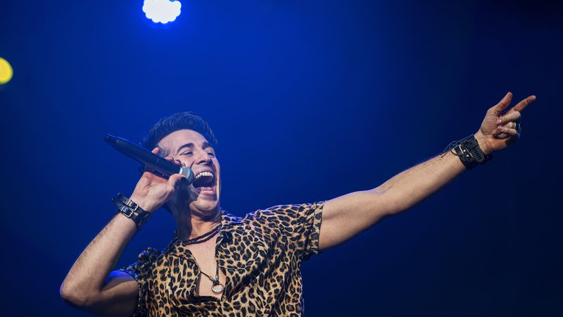 Boy George performing on stage