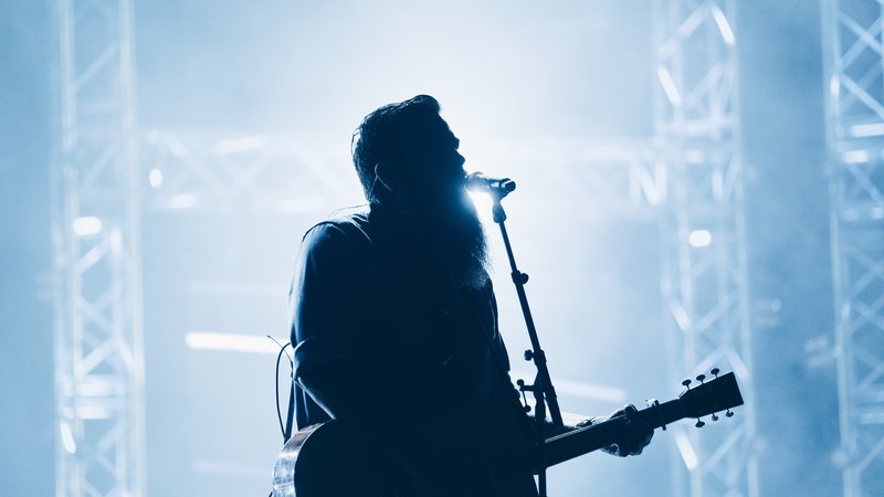 live concert stage with guitar player