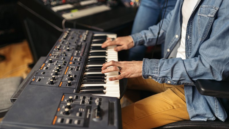 keyboardist playing synthesizer