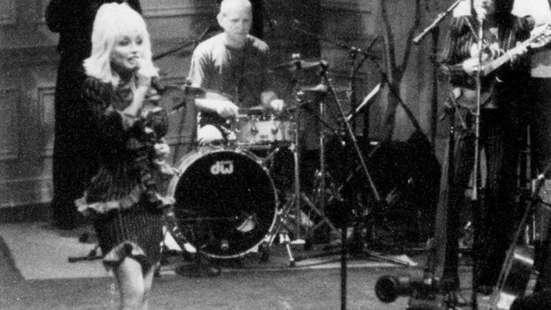 Dolly Parton and her band perform for a Coolidge Auditorium audience at the Library of Congress
