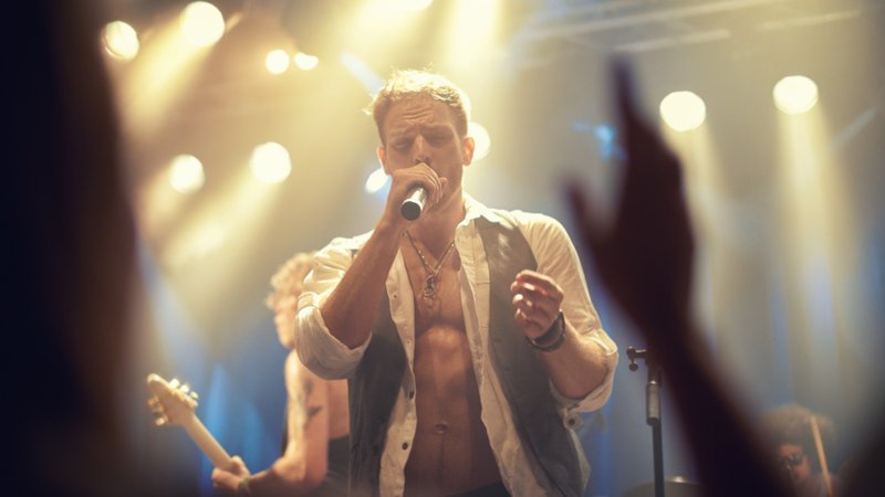 male singer performing on stage